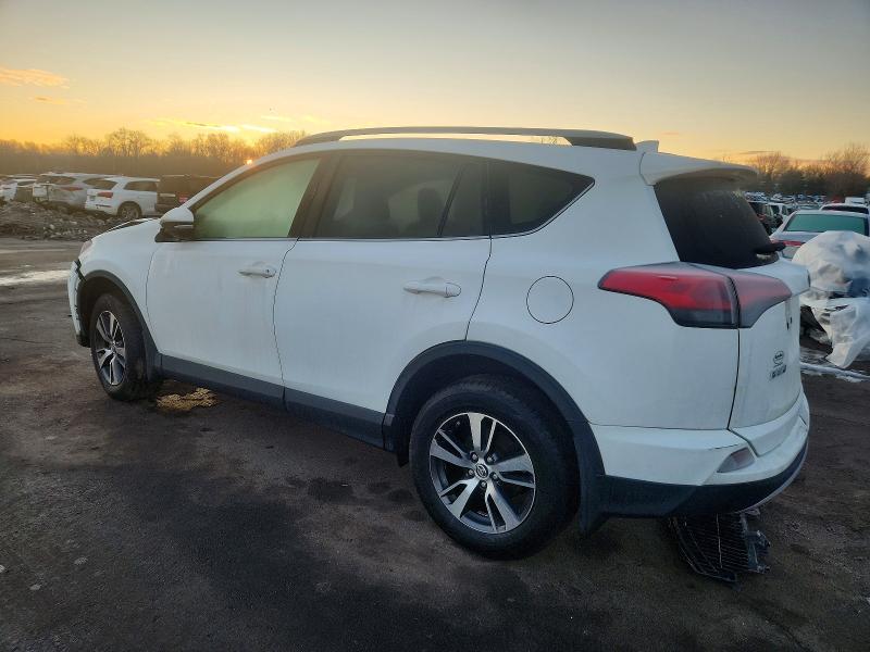 Photo 2 from auction – 2017 TOYOTA RAV4 XLE with VIN JTMRFREV5HJ704120