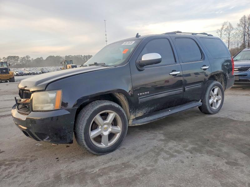 CHEVROLET TAHOE C150 2011 with VIN 1GNSCBE00BR205814 - Photo from auction