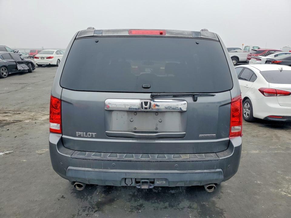 Photo 6 from auction – 2010 HONDA PILOT TOUR with VIN 5FNYF3H95AB018454