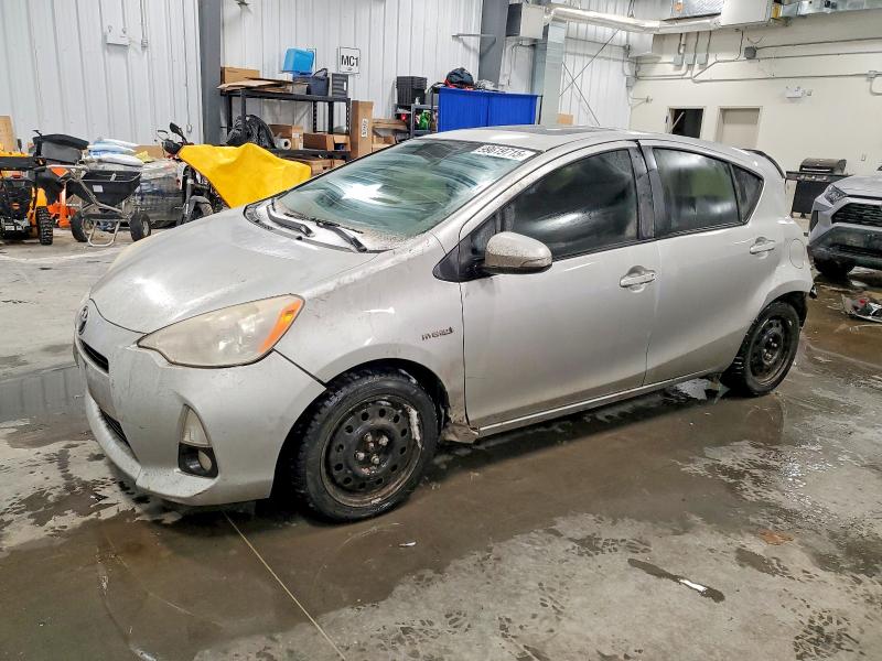TOYOTA PRIUS C 2012 with VIN JTDKDTB39C1004861 - Photo from auction