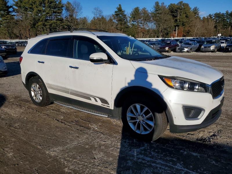 Photo 4 from auction – 2016 KIA SORENTO LX with VIN 5XYPGDA52GG132001