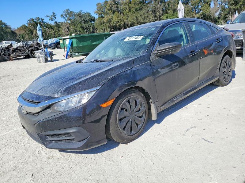 HONDA CIVIC LX 2017 with VIN 19XFC2F55HE000823 - Photo from auction