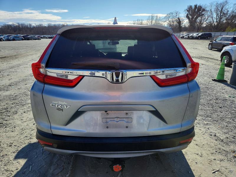 Photo 6 from auction – 2018 HONDA CR-V with VIN 7FARW1H85JE037879