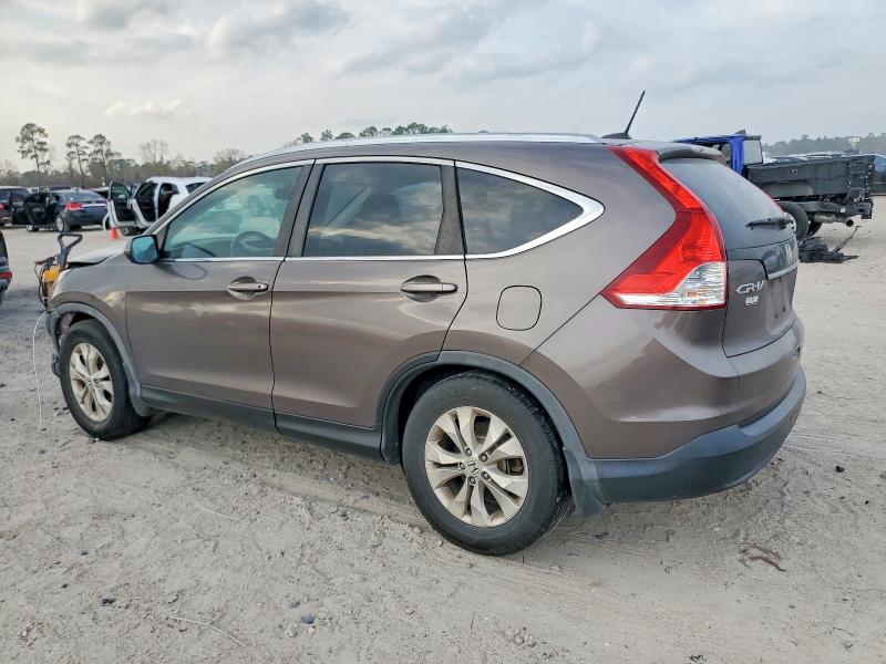 Photo 2 from auction – 2014 HONDA CR-V with VIN 2HKRM3H73EH545263