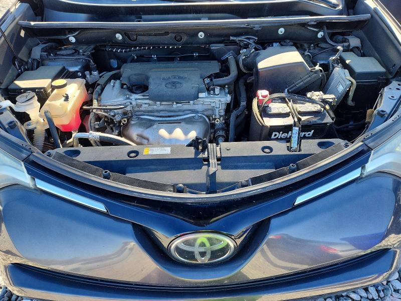 Photo 12 from auction – 2018 TOYOTA RAV4 LE with VIN 2T3ZFREV9JW457210