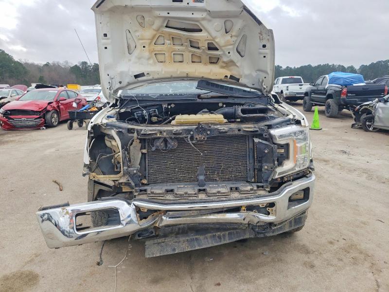 Photo 5 from auction – 2019 FORD F150 with VIN 1FTEW1E59KKE77306