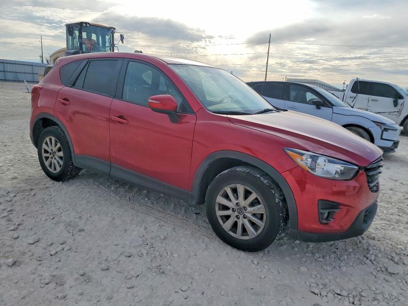Photo 4 from auction – 2016 MAZDA CX-5 with VIN JM3KE2CY1G0608358