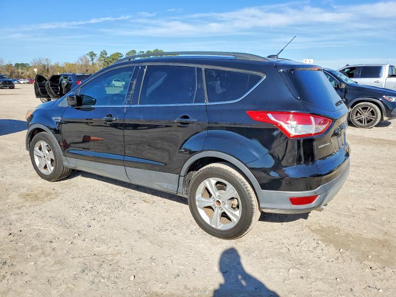 Photo 2 from auction – 2016 FORD ESCAPE SE with VIN 1FMCU0GX7GUA38554