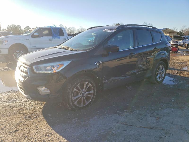 FORD ESCAPE 2017 with VIN 1FMCU0GD2HUB64893 - Photo from auction