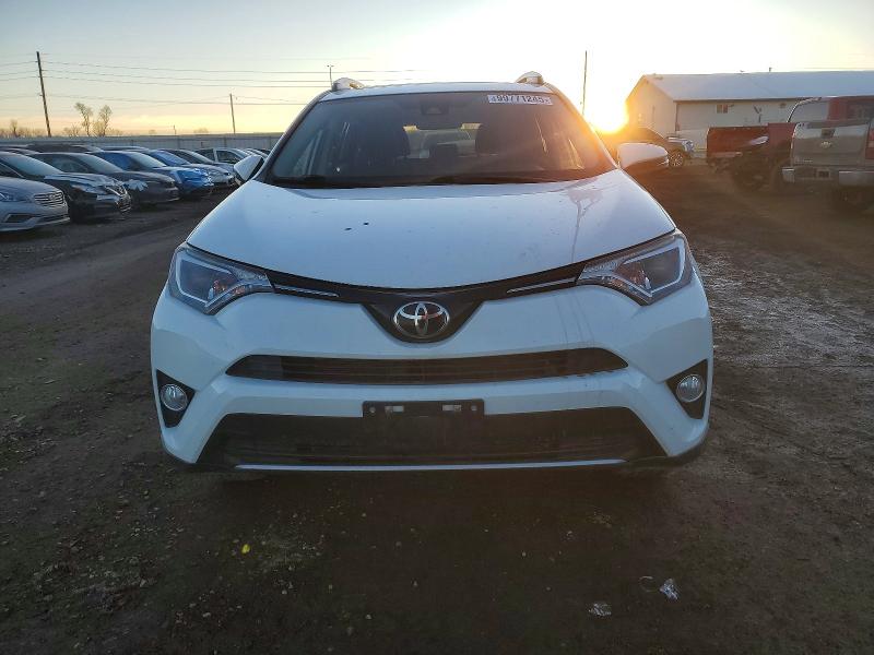 Photo 5 from auction – 2017 TOYOTA RAV4 XLE with VIN JTMRFREV8HD218366
