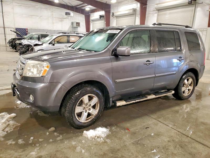 HONDA PILOT EXL 2011 with VIN 5FNYF4H50BB033254 - Photo from auction