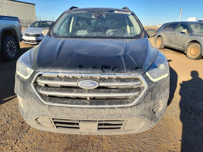 Photo 5 from auction – 2017 FORD ESCAPE TIT with VIN 1FMCU9J97HUB70200