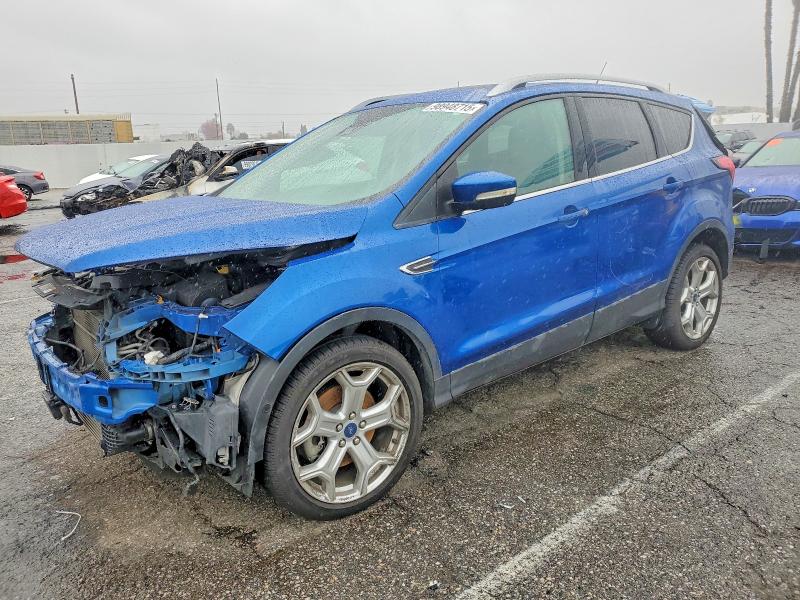 FORD ESCAPE TIT 2019 with VIN 1FMCU0J97KUB61774 - Photo from auction