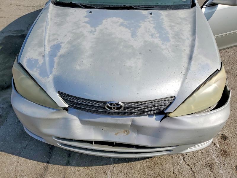 Photo 11 from auction – 2004 TOYOTA CAMRY LE with VIN 4T1BE32K34U263975