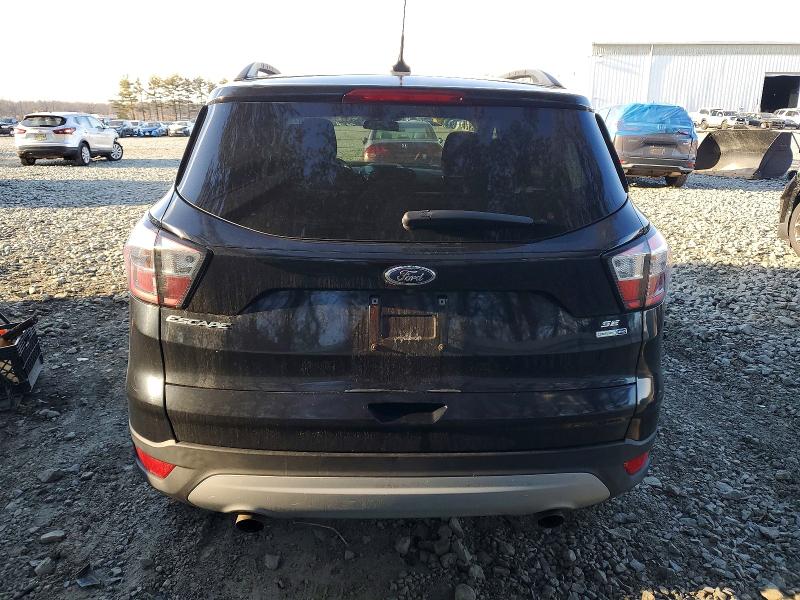 Foto 6 de la subasta – 2018 FORD ESCAPE con VIN 1FMCU9GD3JUB58207