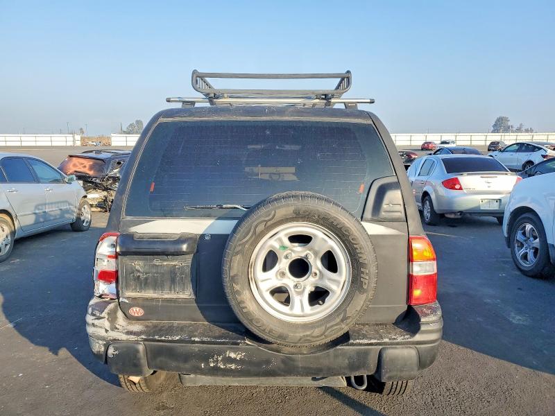 Foto 6 de la subasta – 1999 CHEVROLET TRACKER con VIN 2CNBJ13C5X6919894