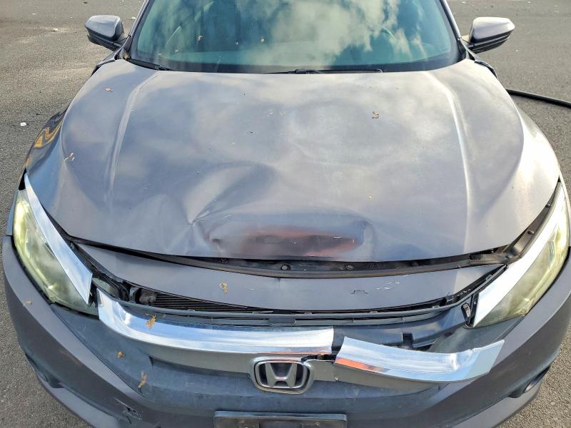 Photo 11 from auction – 2018 HONDA CIVIC EX with VIN 2HGFC3B38JH352719