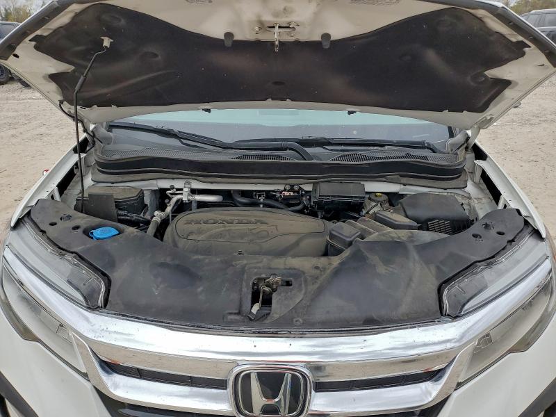 Photo 12 from auction – 2021 HONDA PILOT TOUR with VIN 5FNYF5H63MB035808