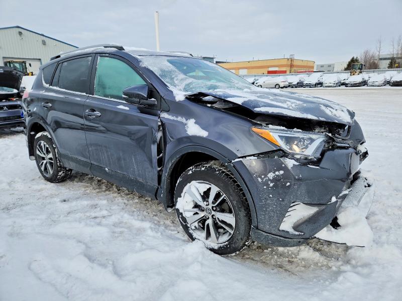 Photo 4 from auction – 2018 TOYOTA RAV4 with VIN 2T3ZFREV5JW505706