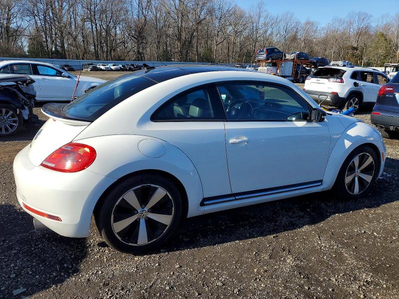 Photo 3 from auction – 2013 VOLKSWAGEN BEETLE with VIN 3VW4S7AT7DM684736