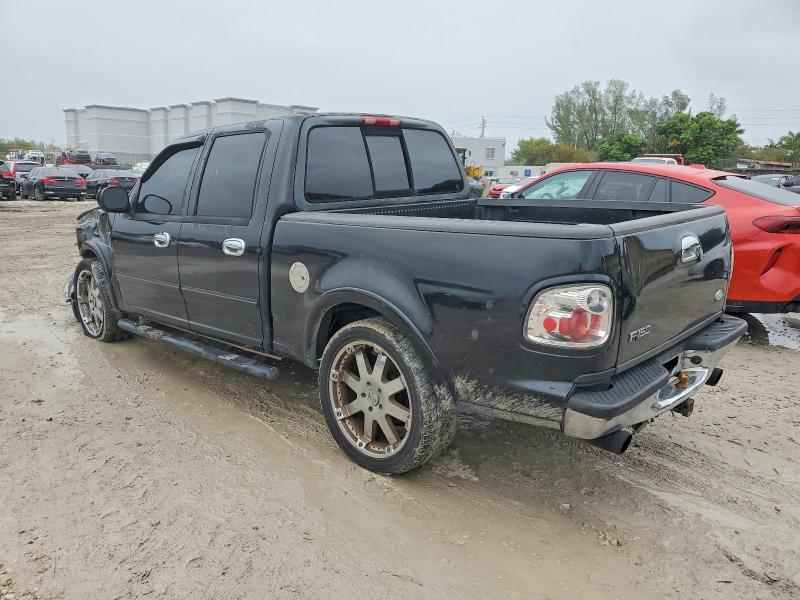 Photo 2 from auction – 2001 FORD F150 with VIN 1FTRW07L21KC60105