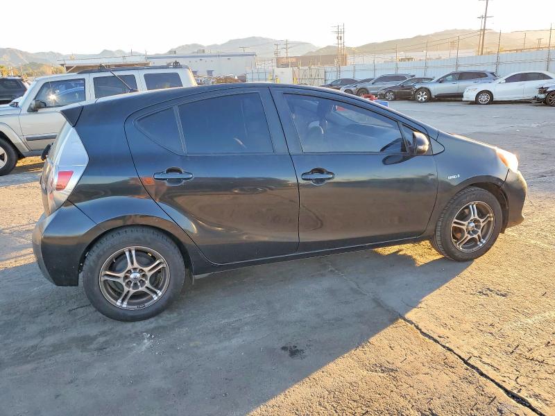 Photo 3 from auction – 2014 TOYOTA PRIUS C with VIN JTDKDTB32E1567043