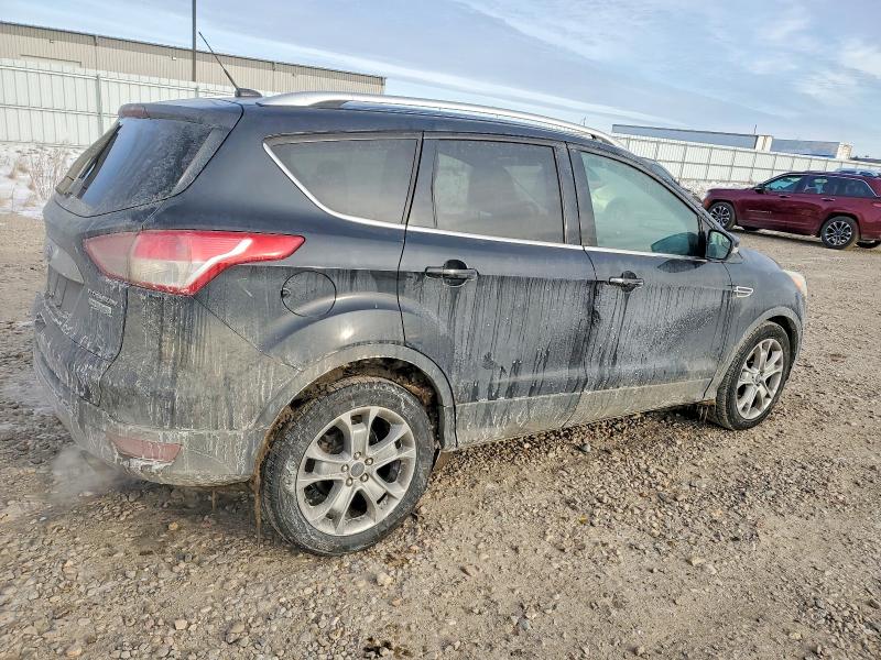 Photo 3 from auction – 2015 FORD ESCAPE with VIN 1FMCU0J90FUB25575