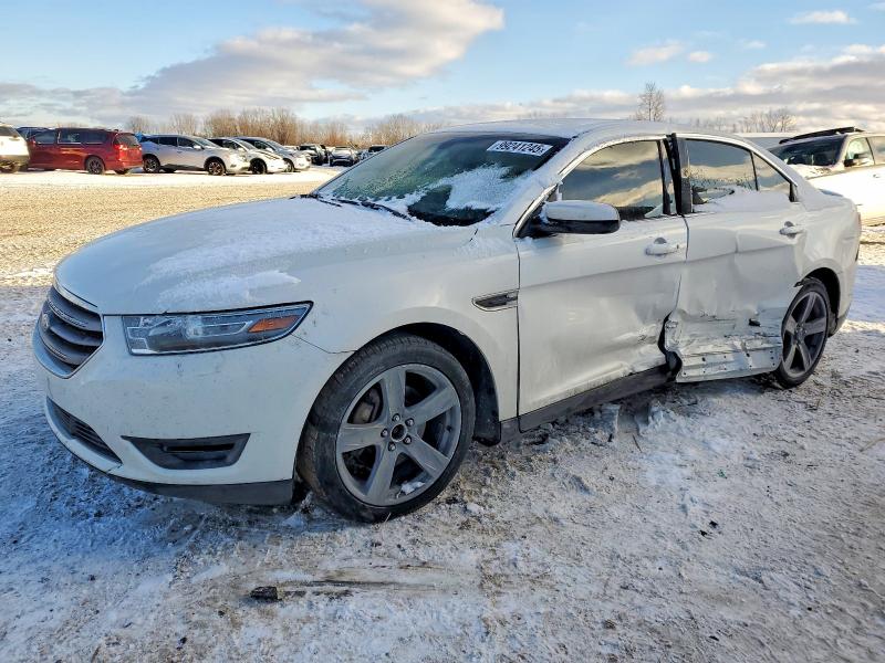 FORD TAURUS SEL 2014 with VIN 1FAHP2E89EG123096 - Photo from auction