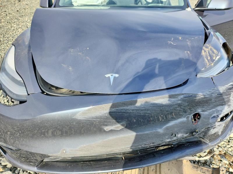 Photo 11 from auction – 2021 TESLA MODEL Y with VIN 5YJYGDEE2MF093475