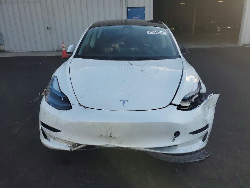 Photo 5 from auction – 2023 TESLA MODEL 3 with VIN 5YJ3E1EA9PF569334