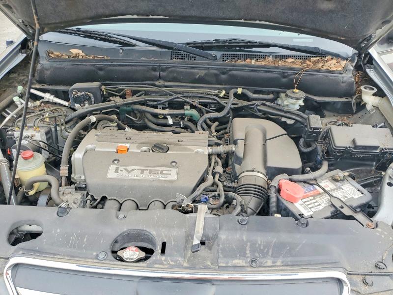 Photo 12 from auction – 2005 HONDA CR-V LX with VIN JHLRD78525C036852