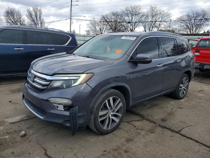 HONDA PILOT 2018 with VIN 5FNYF6H00JB049629 - Photo from auction
