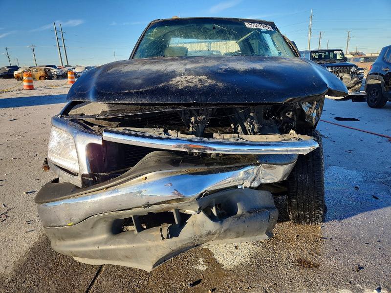 Photo 5 from auction – 2001 FORD F150 with VIN 1FTRW07WX1KF58203