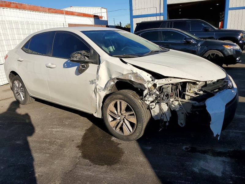 Photo 4 from auction – 2014 TOYOTA COROLLA EC with VIN 5YFBPRHE1EP085436
