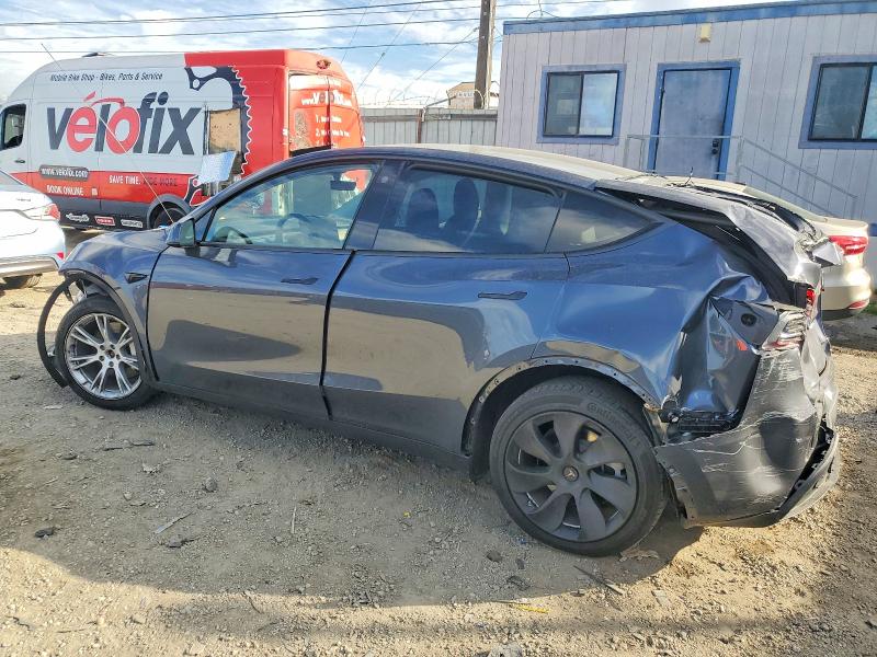 Photo 2 from auction – 2023 TESLA MODEL Y with VIN 7SAYGDEE1PA054249