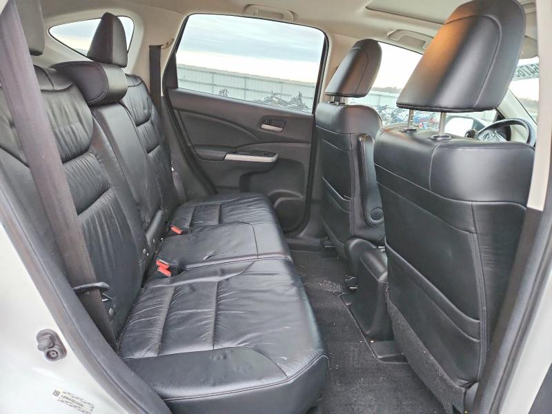 Photo 11 from auction – 2014 HONDA CR-V EXL with VIN 5J6RM4H79EL042364