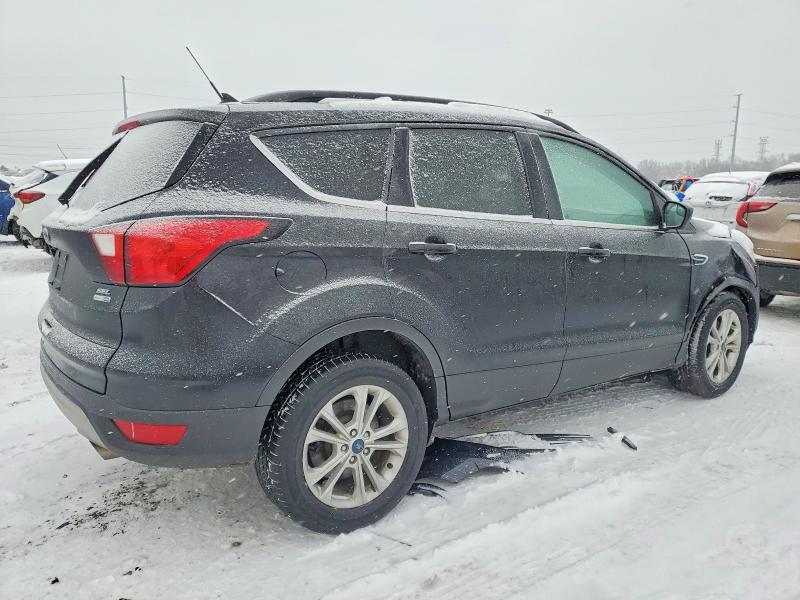 Photo 3 from auction – 2019 FORD ESCAPE with VIN 1FMCU9HDXKUA81237