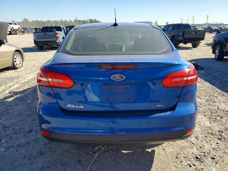 Photo 6 from auction – 2018 FORD FOCUS with VIN 1FADP3H21JL286693