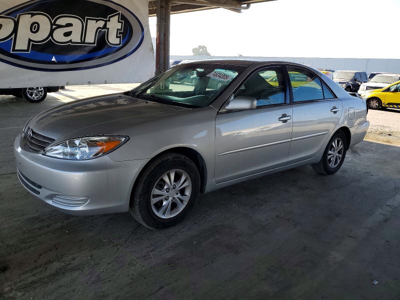 TOYOTA CAMRY LE 2004 with VIN 4T1BF30K74U577743 - Photo from auction