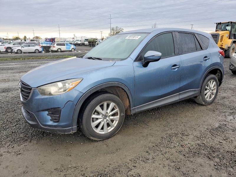MAZDA CX-5 2016 with VIN JM3KE2BYXG0676157 - Photo from auction