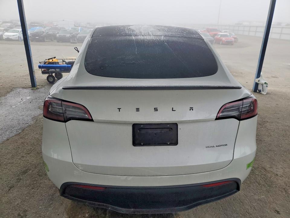 Photo 6 from auction – 2023 TESLA MODEL Y with VIN 7SAYGDEE1PF663554