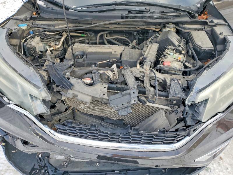Photo 12 from auction – 2015 HONDA CR-V EX with VIN 2HKRM4H53FH657678