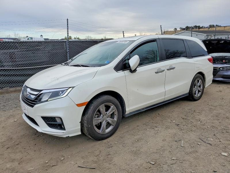 HONDA ODYSSEY 2018 with VIN 5FNRL6H79JB104119 - Photo from auction