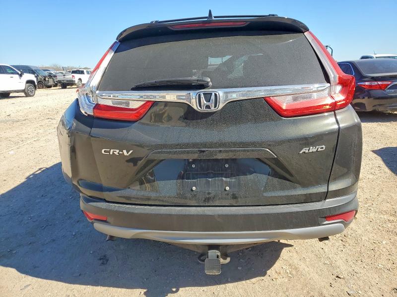 Photo 6 from auction – 2018 HONDA CR-V EX with VIN 7FARW2H50JE004378