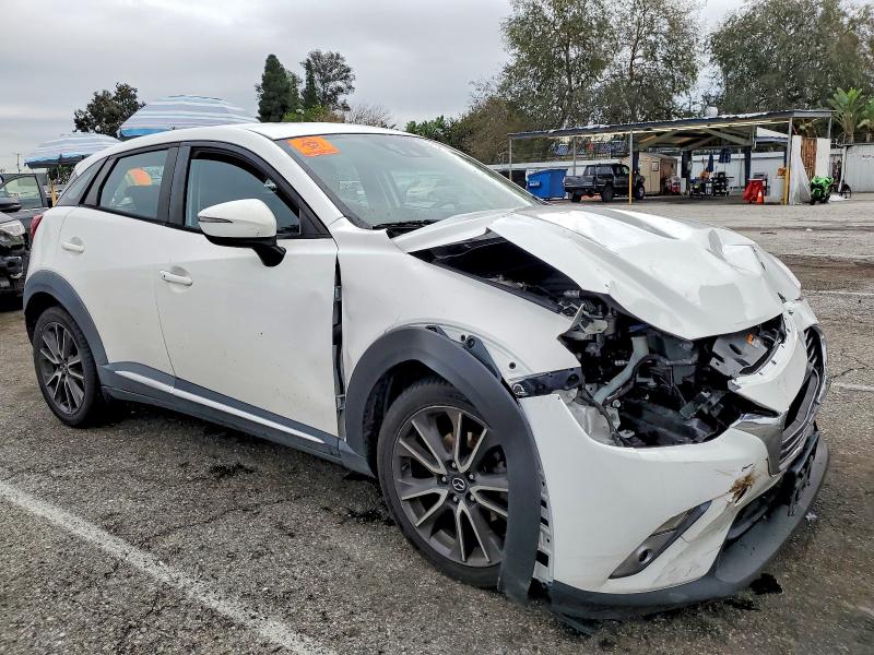 Photo 4 from auction – 2016 MAZDA CX-3 GRAND with VIN JM1DKBD70G0105792
