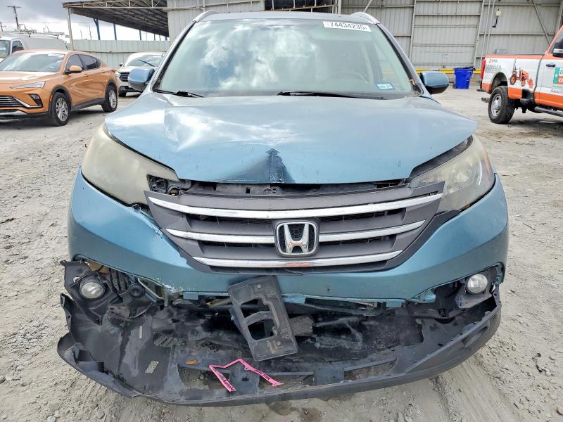 Photo 5 from auction – 2014 HONDA CR-V with VIN 2HKRM3H76EH527923