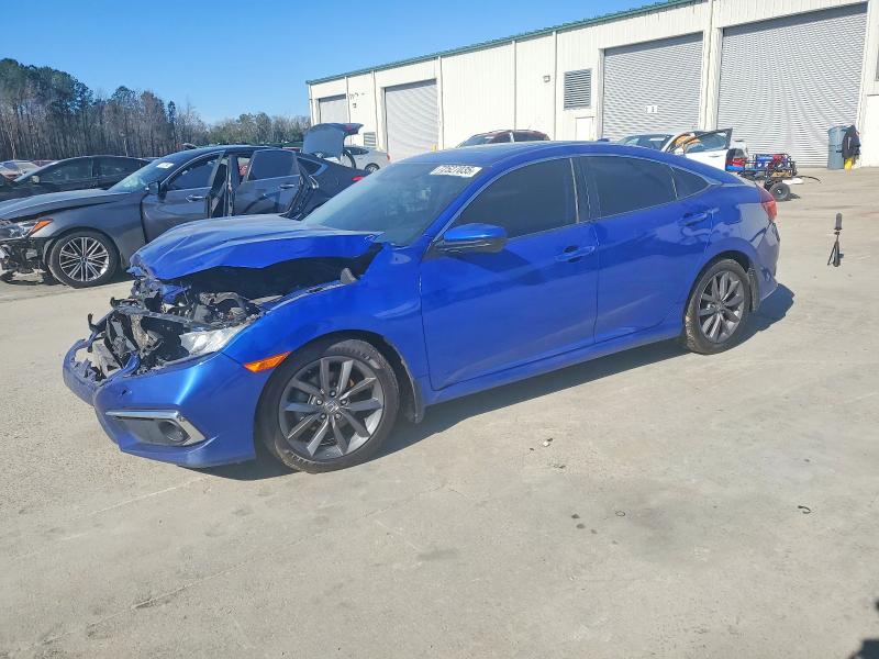 HONDA CIVIC EX 2019 with VIN 19XFC1F3XKE006116 - Photo from auction