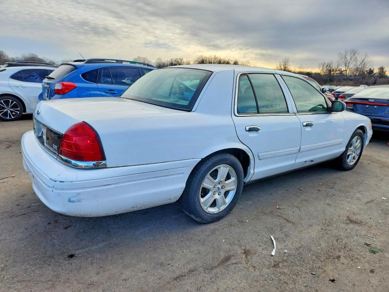 Photo 3 from auction – 2011 FORD CROWN VICT with VIN 2FABP7EV7BX146763