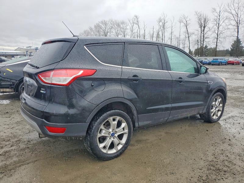 Photo 3 from auction – 2013 FORD ESCAPE with VIN 1FMCU9H91DUB86084