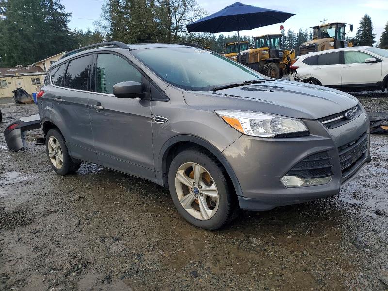 Photo 4 from auction – 2014 FORD ESCAPE SE with VIN 1FMCU9G9XEUD03311